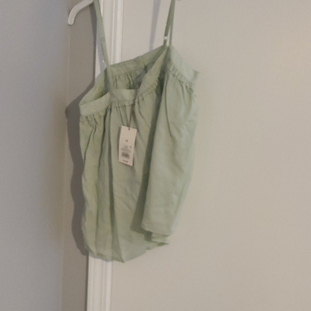 A new day mint green tank